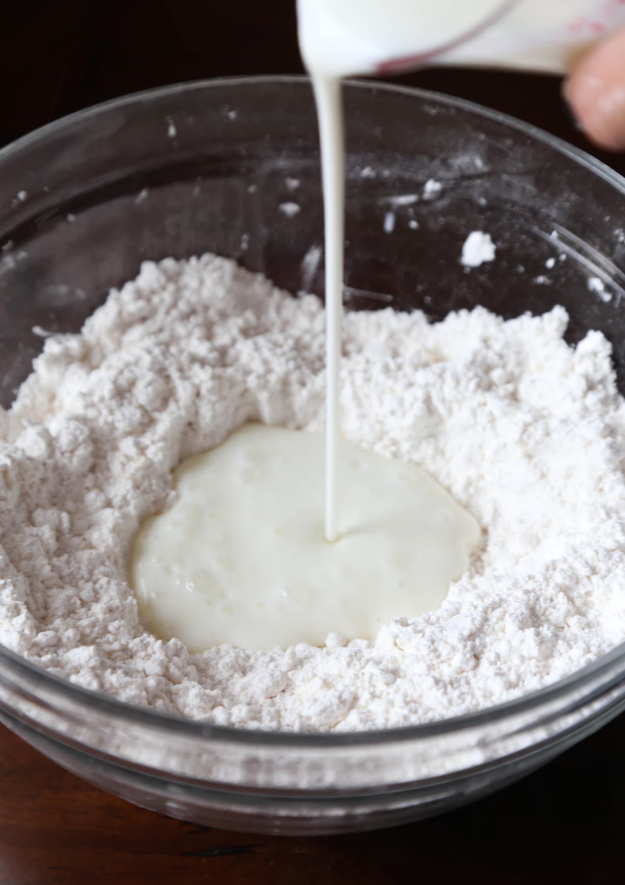 Adding buttermilk into butter and flour mixture