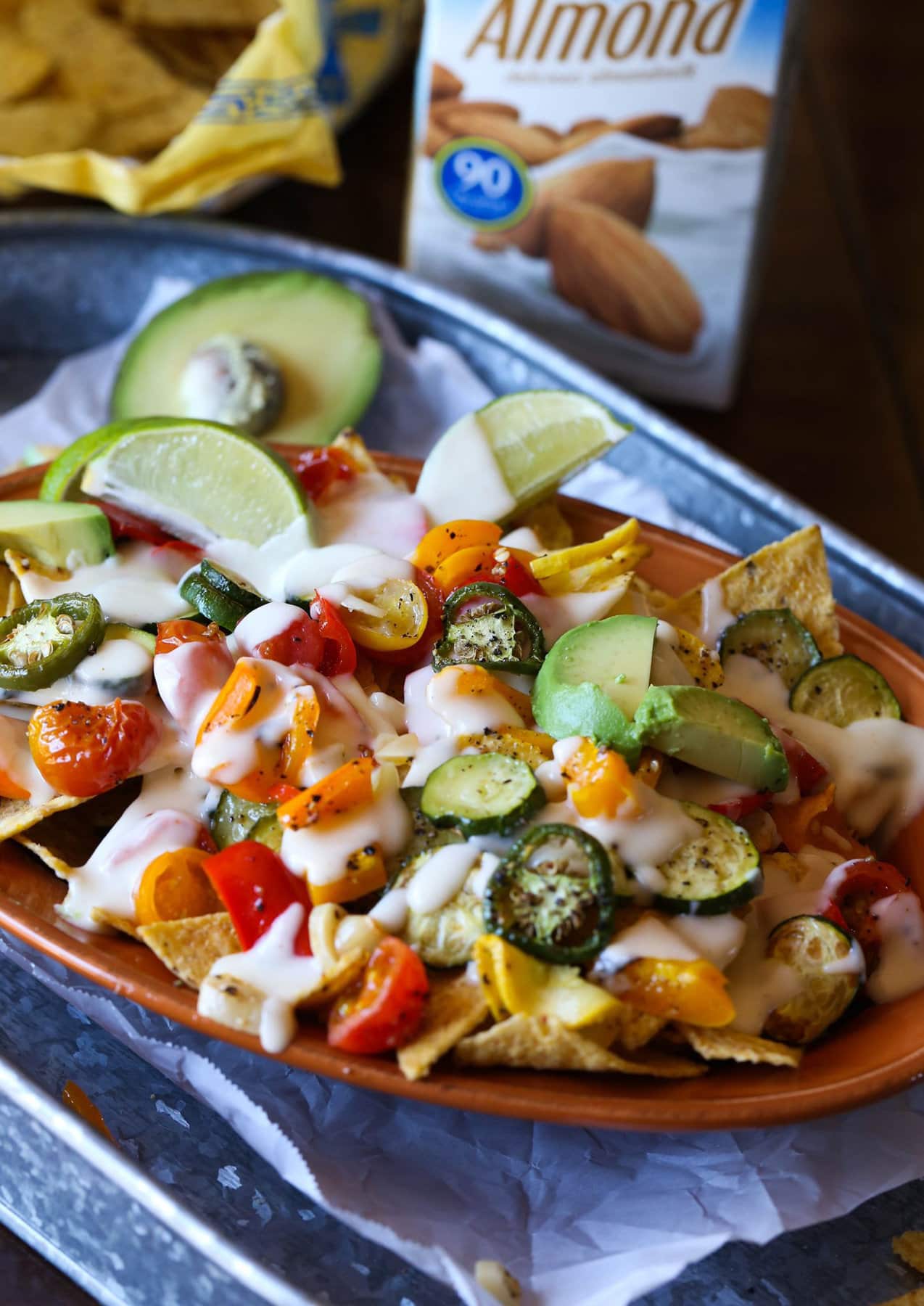 Veggie nachos served with lime