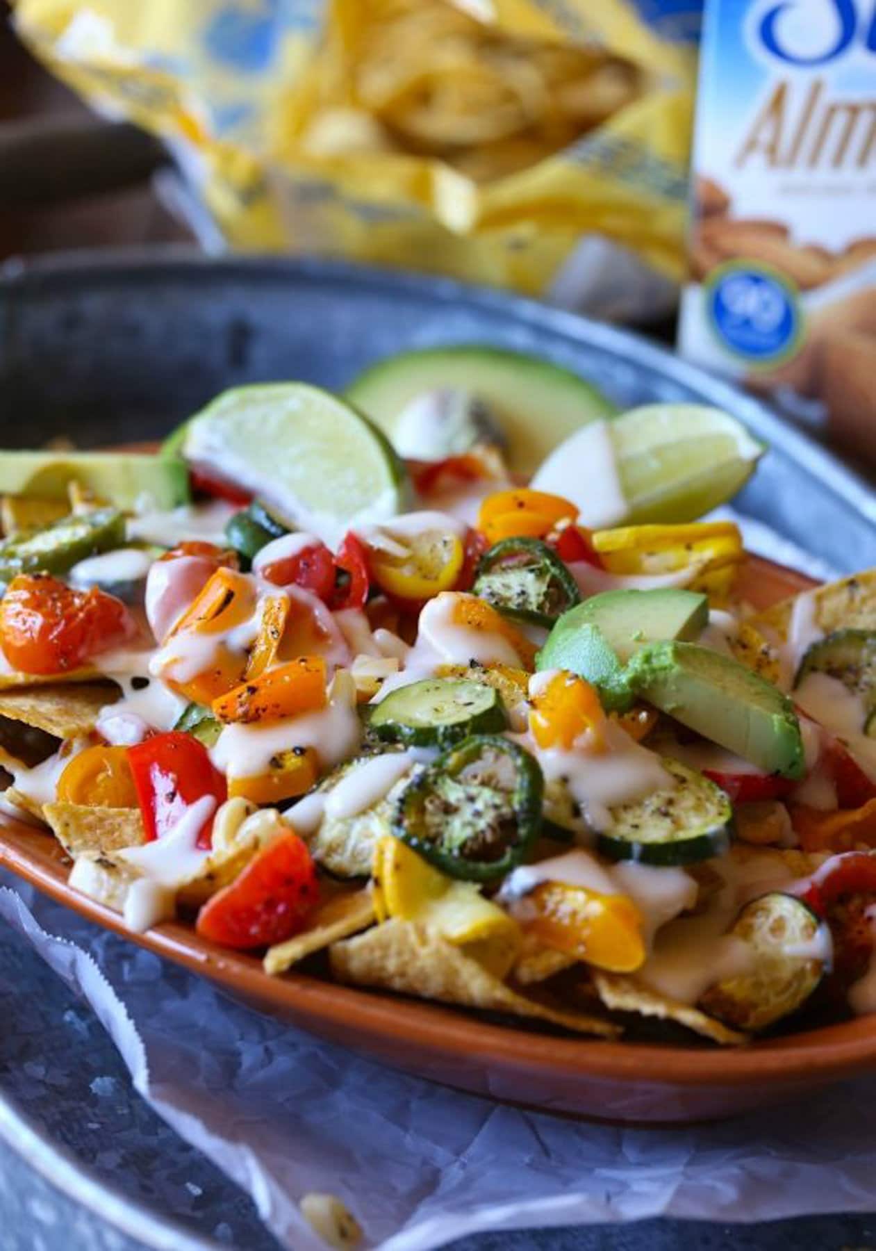 Nachos with veggies served to eat