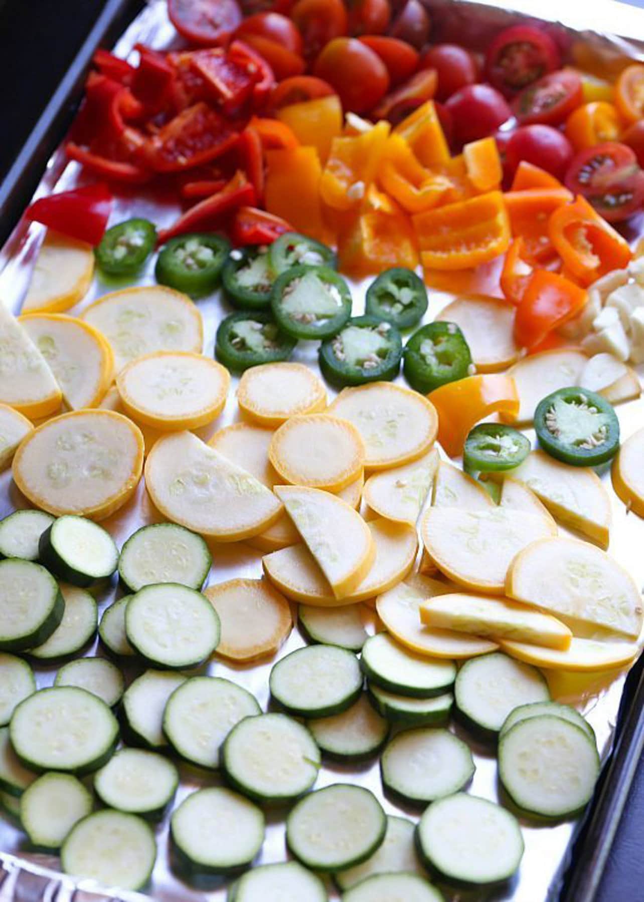 Vegetables on a pan before getting roasted