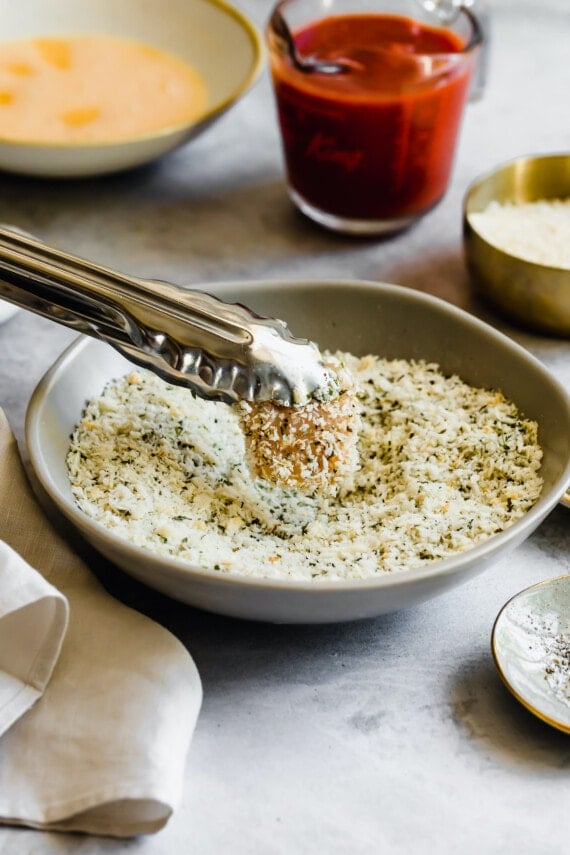 Chicken dipped in breadcrumbs.