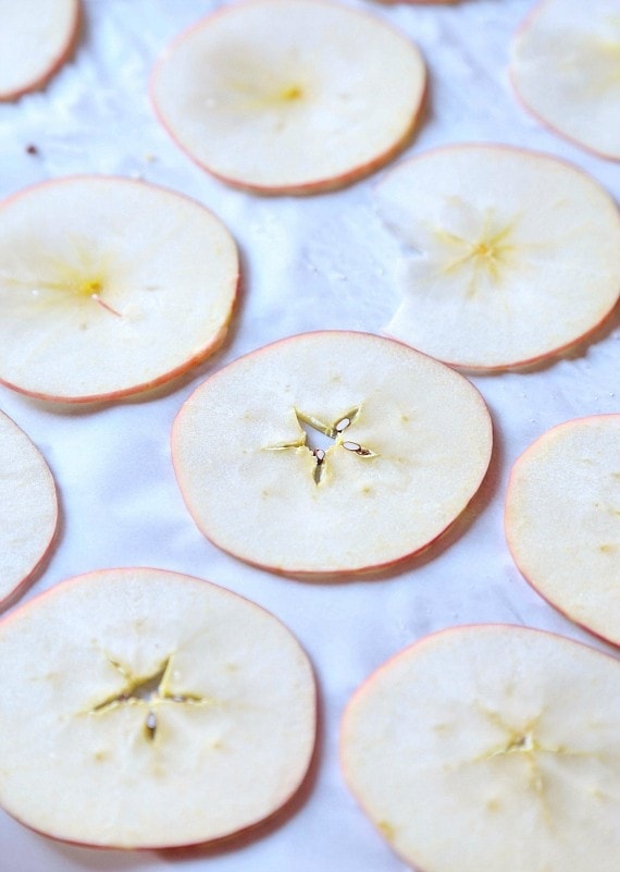 SLice up apple and bake them for crispy apple chips!