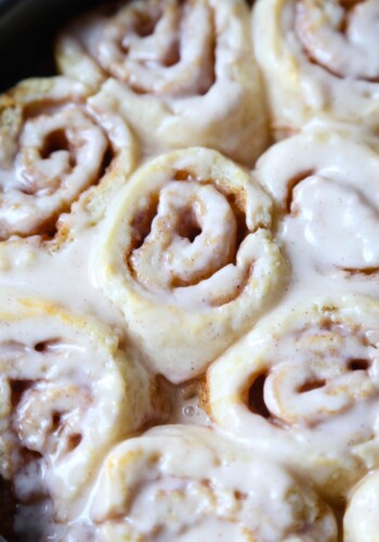 Super easy Warm and glazed Biscuit Cinnamon Rolls...so easy and ready in under 30 minutes!