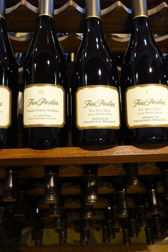 Three bottles of Fess Parker pinot noir on a shelf