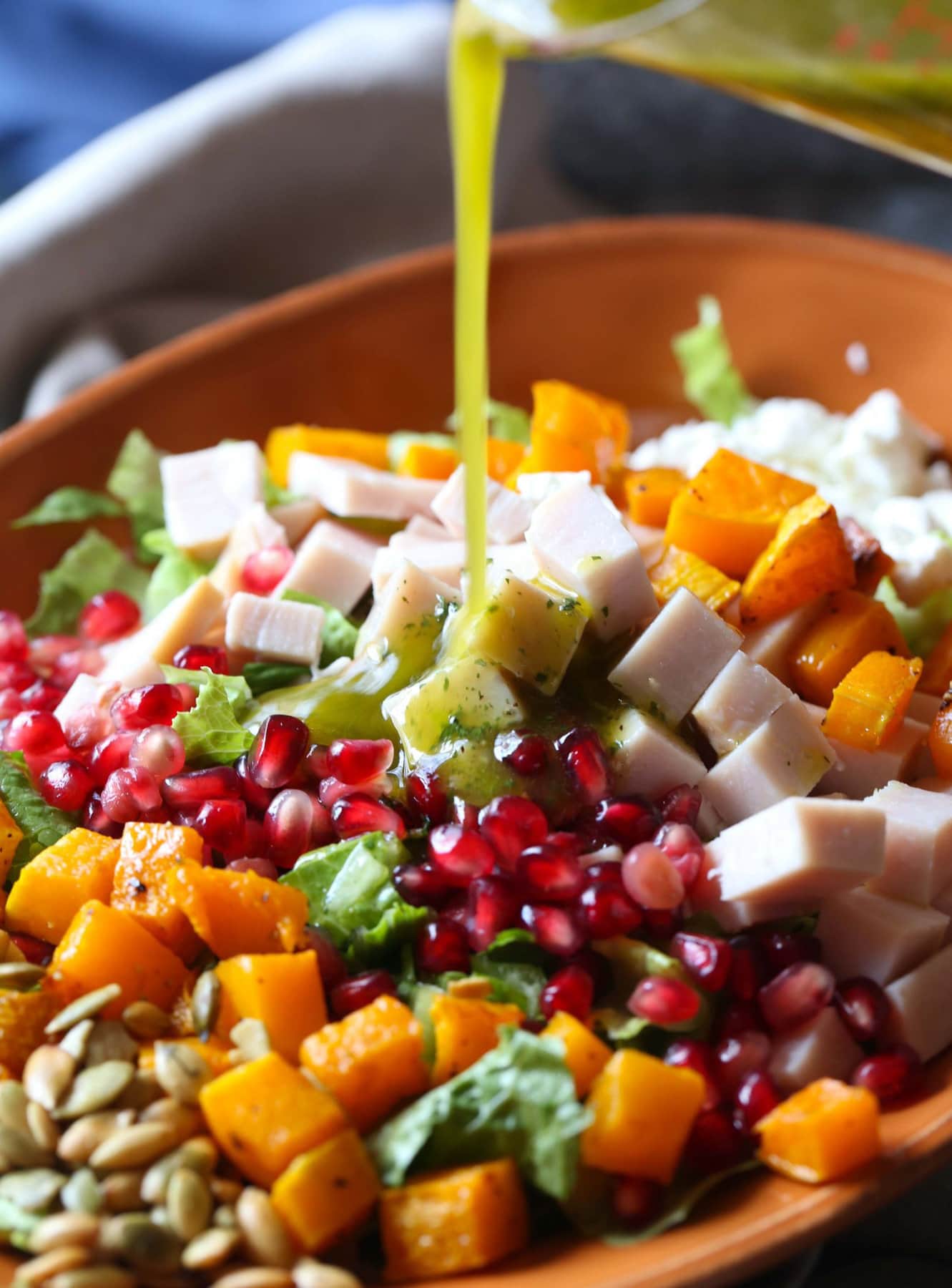 Drizzling ranch salad dressing topping Thanksgiving leftover chopped salad