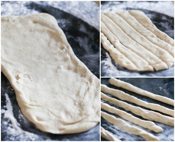 Dough on a counter, rolled out and then cut into strands.