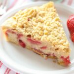 This Strawberry Buckle Recipe is moist, dense and topped with delicious crumb topping!