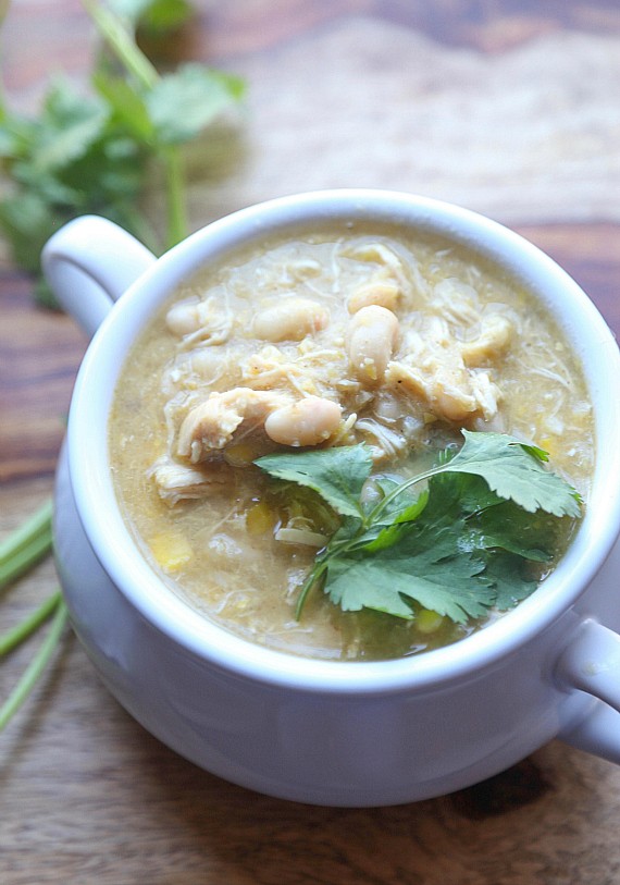 A mug full of creamy Salsa Verde White Chicken Chili.