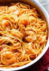One-pot shrimp pasta in a skillet.