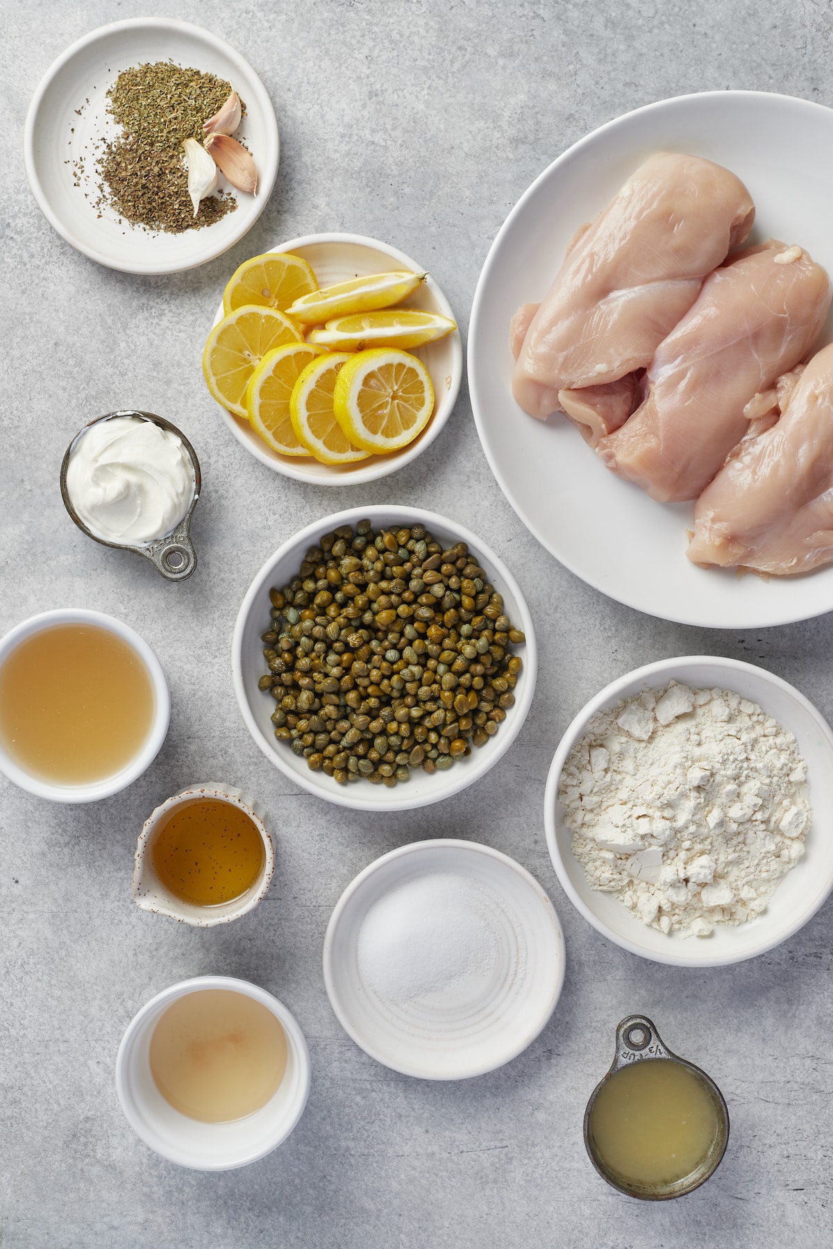 The ingredients for homemade chicken piccata.
