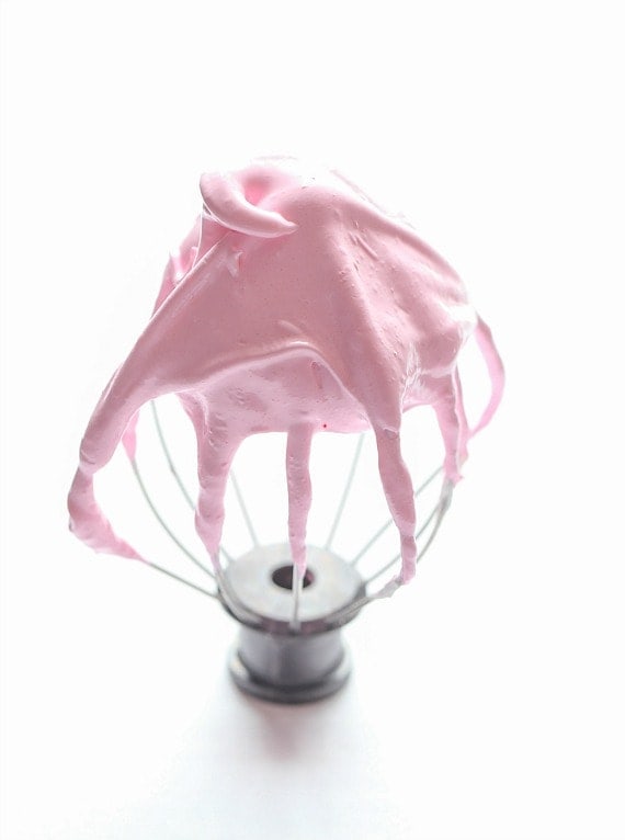 Pink Meringue on a stand mixer attachment.