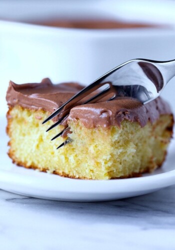 This is the easiest and softest sour cream cake ever. My family asks for it again and again and the chocolate frosting is easily the creamiest I ever had!
