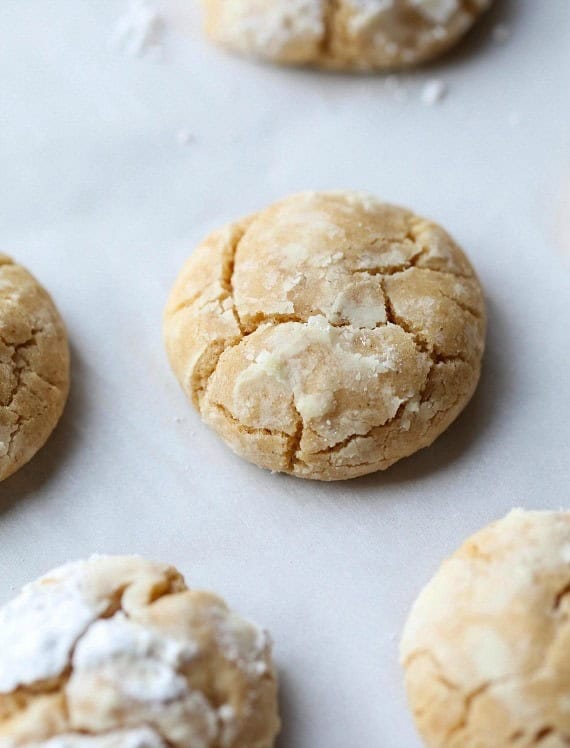 Brown Butter Cinnamon Crinkle Cookies are possibly the coziest cookie to ever exist. They're sweet, full of brown butter and cinnamon goodness coated in melt in your mouth powdered sugar that gives them the perfect crinkle look!