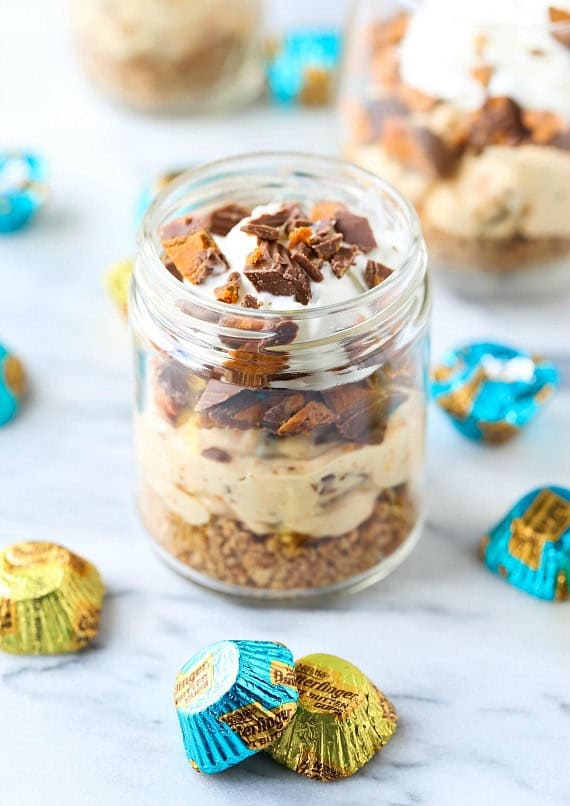 No bake Butterfinger cheesecake in a glass mason jar.