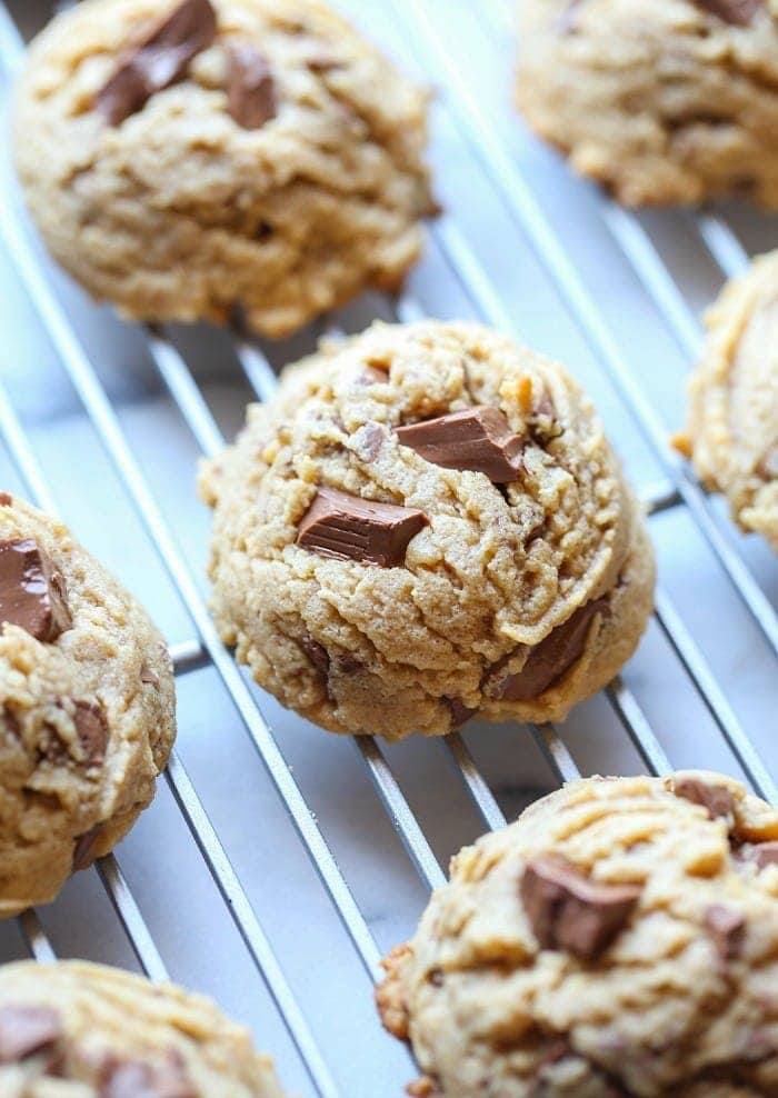 These Soft Peanut Butter Chocolate Chunk Cookies are thick and loaded with milk chocolate chunks. Perfect with a glass of milk!