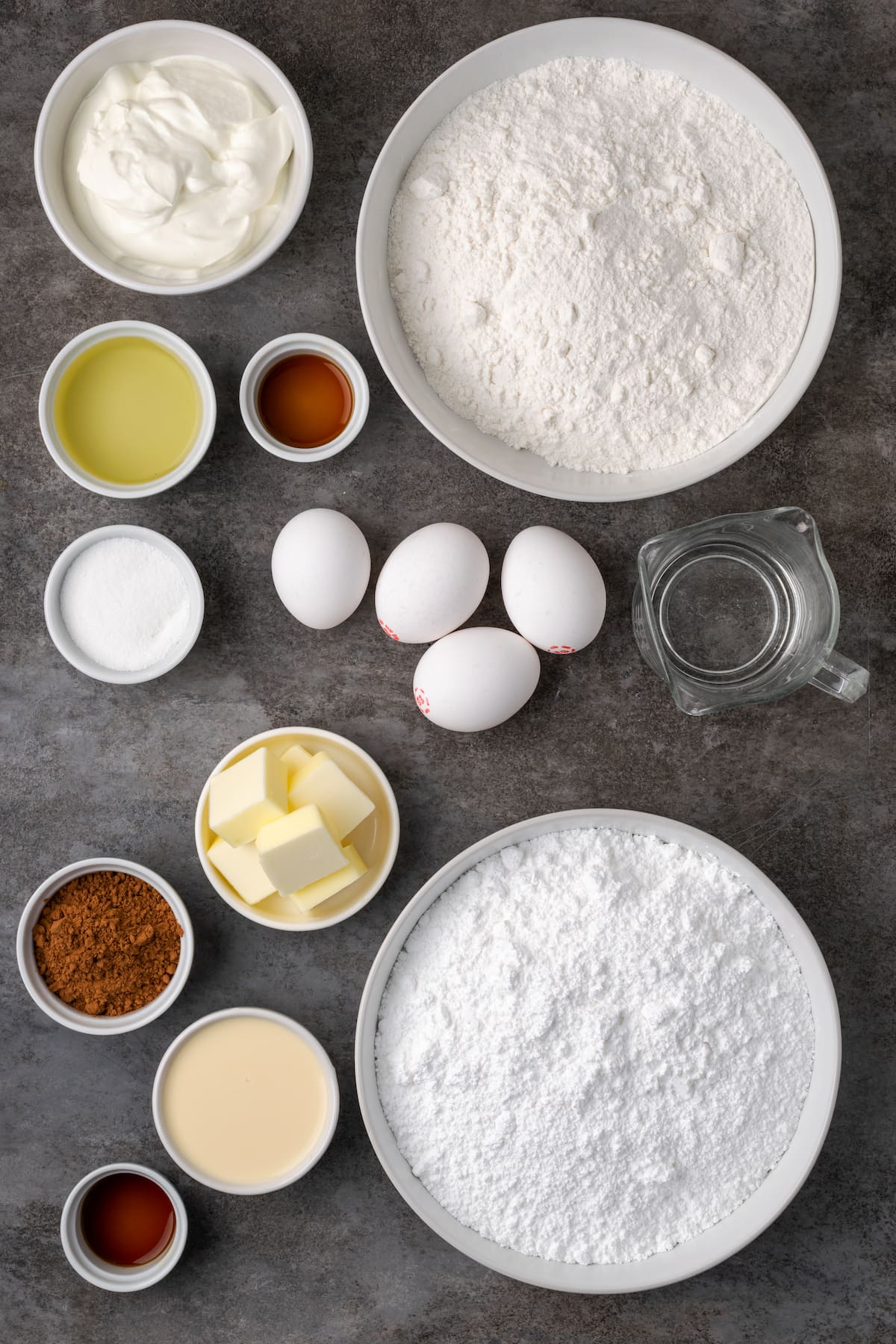 The ingredients for sour cream cake with chocolate frosting.