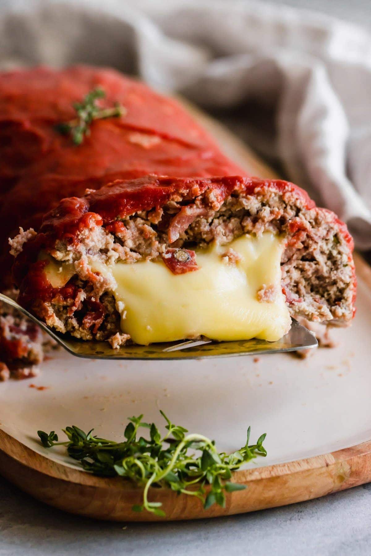 Pizza stuffed meatloaf with mozzarella cheese.