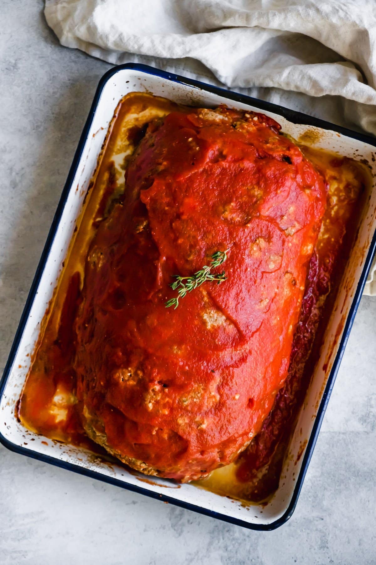 Pizza Meatloaf covered in sauce.