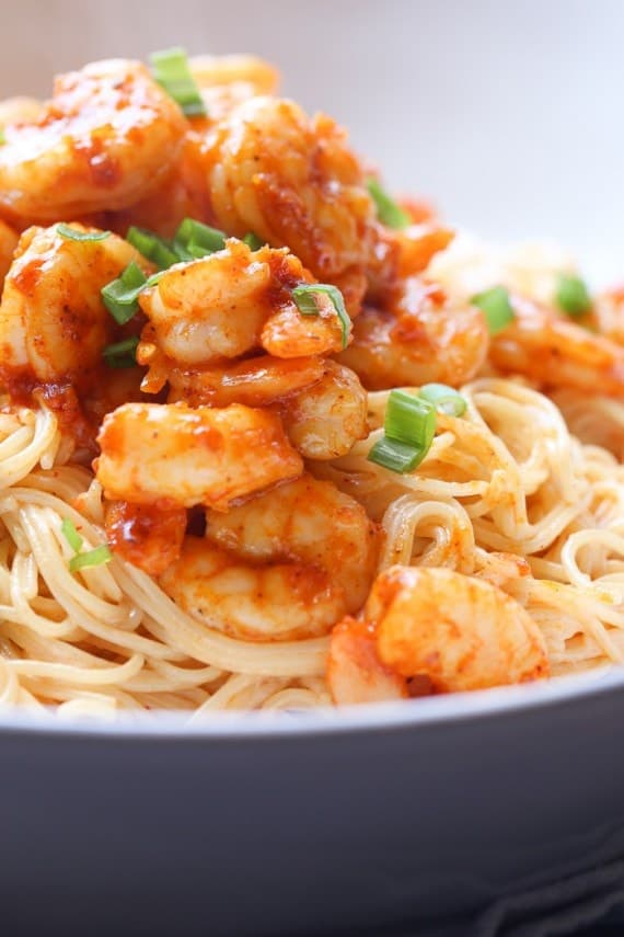 Skinny Bang Bang Shrimp Pasta is an easy shrimp recipe that is loaded with flavor and lighter on calories! 