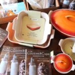 Cookbooks, Boxes of Food and the Rest of the Giveaway Prizes on a Tabletop