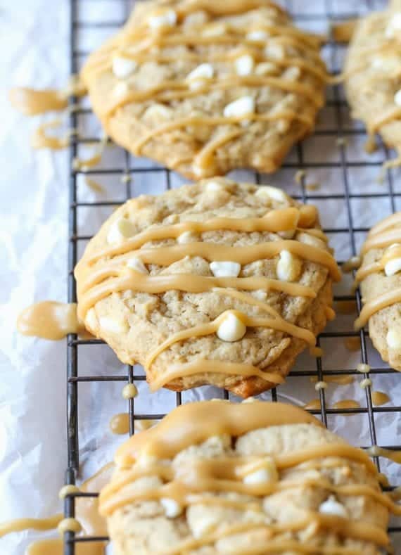 Bananas Foster Cookies... RIDICULOUSLY GOOD! Soft banana cookies, loaded with white chocolate and drizzled with Brown Sugar Rum sauce!