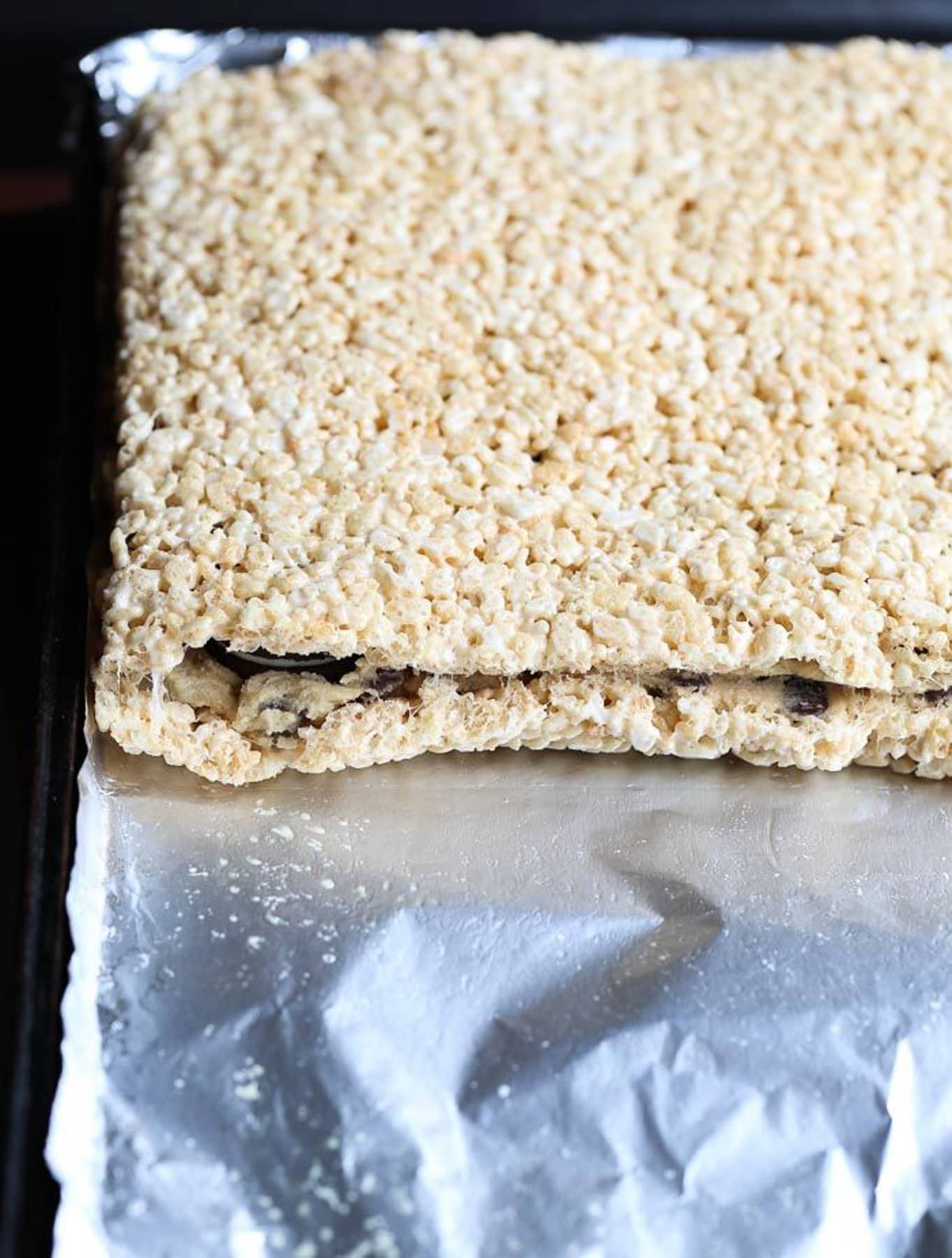 Topping oreos with rice krispie treats