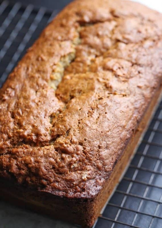 Cheesecake Stuffed Banana Bread...it's a classic treat turned on it's head. The thick ribbon of cheesecake is creamy, rich and the perfect pairing with the buttery banana bread!