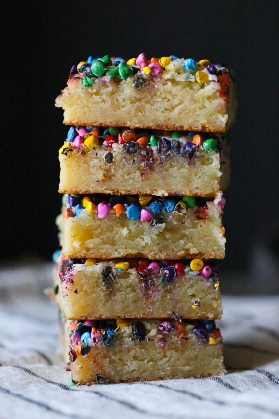 Rainbow Chip Blondies...no mixer required for these insanely buttery, chewy blondies topped with colorful rainbow chips...or even sprinkles!