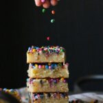 Rainbow Chip Blondies...no mixer required for these insanely buttery, chewy blondies topped with colorful rainbow chips...or even sprinkles!