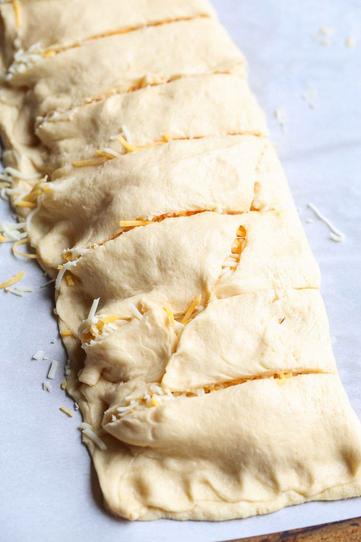 Crescent roll rolled over cheese