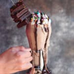 Holding the Rainbow Chip Brownie Milkshake