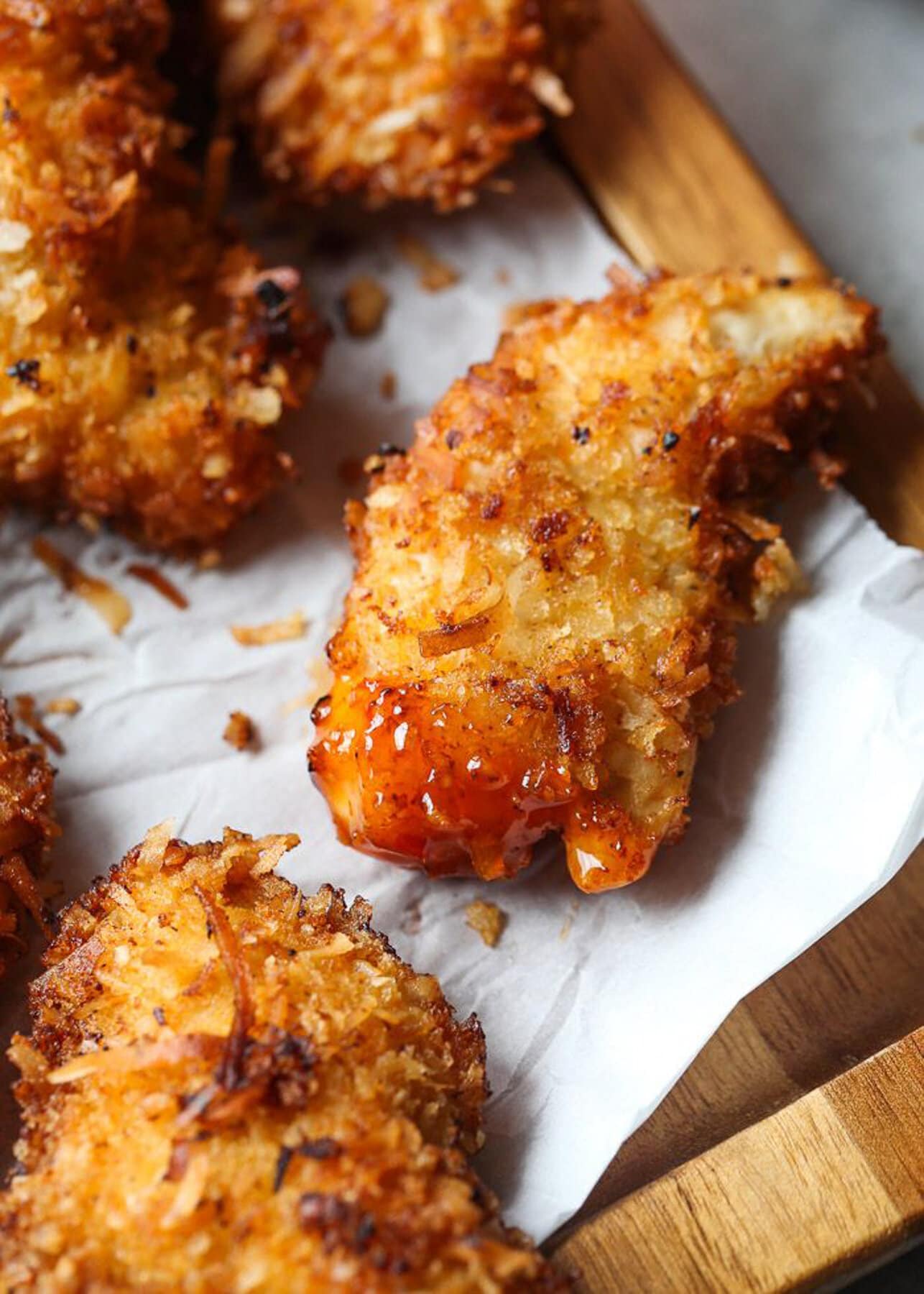 Crispy coconut chicken dipped in sauce