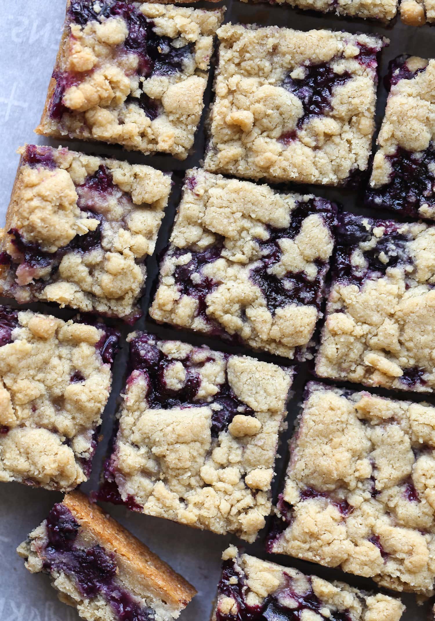Cut the blueberry crumble bars into squares from above