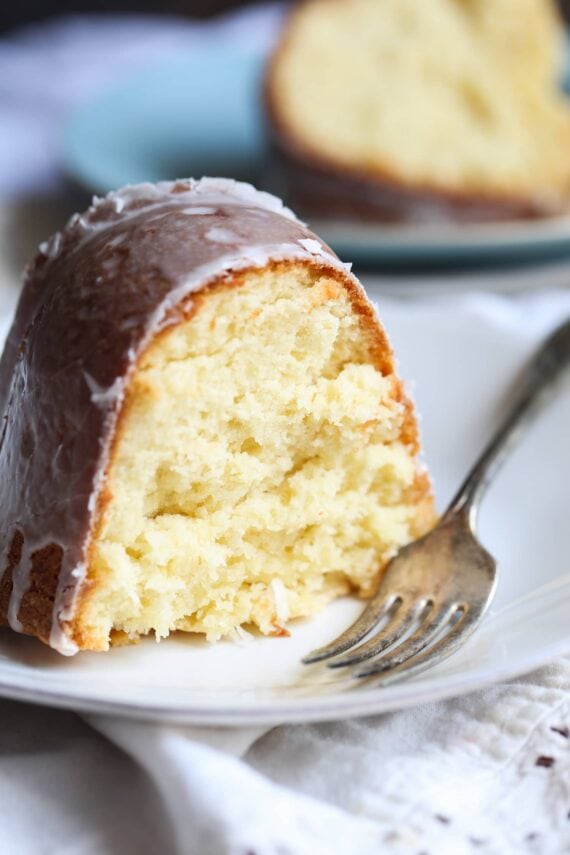 Coconut Cream Cheese Pound Cake...soft, sweet pound cake with coconut throughout. My new favorite cake!
