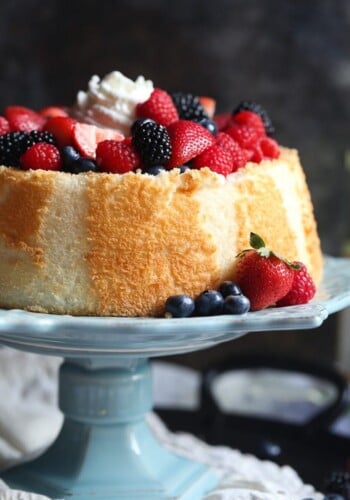 Soft and light Angel Food Cake topped with Wine Soaked Berries! So easy and elegant!