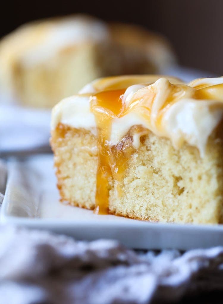 Quick and Easy Caramel Cake topped with creamy cream cheese frosting!
