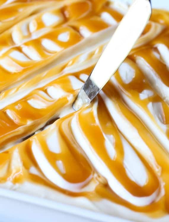 Creamy Cream Cheese Frosting swirled with caramel.