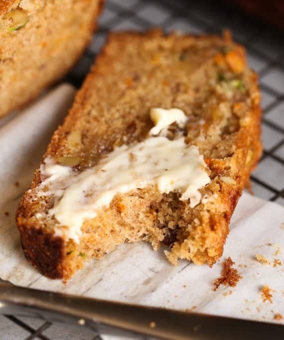 Autumn Bread is an ultra moist quick bread/cake that's a combination of zucchini bread, banana bread, and carrot cake! The perfect fall treat!