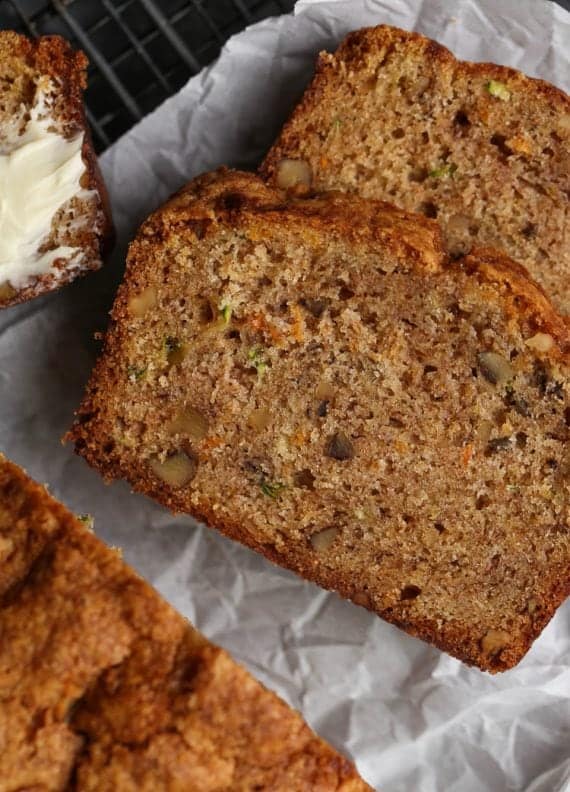 Autumn Bread is an ultra moist quick bread/cake that's a combination of zucchini bread, banana bread, and carrot cake! The perfect fall treat!