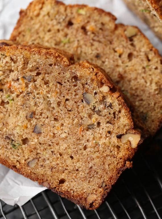 Autumn Bread is an ultra moist quick bread/cake that's a combination of zucchini bread, banana bread, and carrot cake! The perfect fall treat!