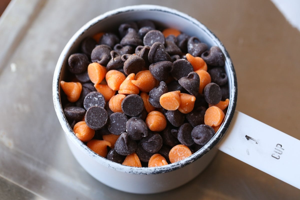 chocolate and orange chips in a measuring cup