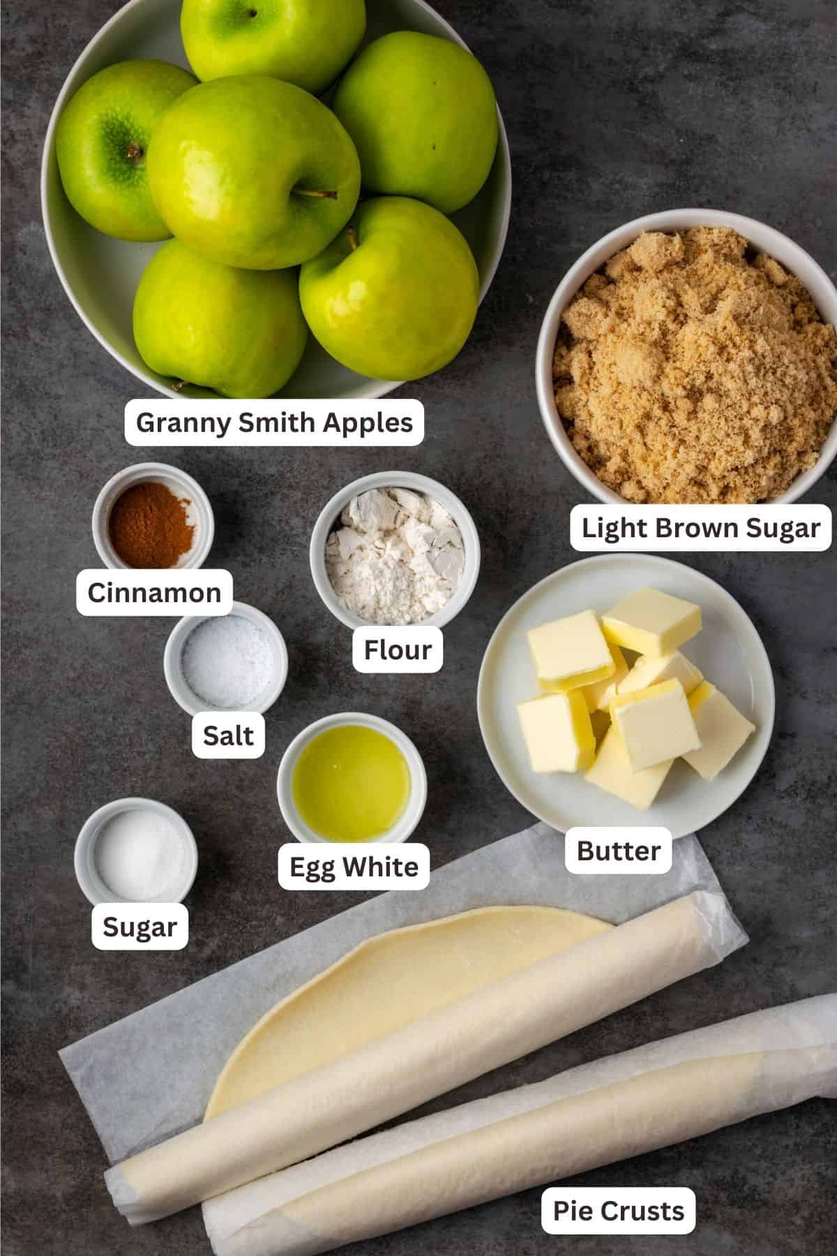 Ingredients for skillet apple pie with text labels overlaying each ingredient.