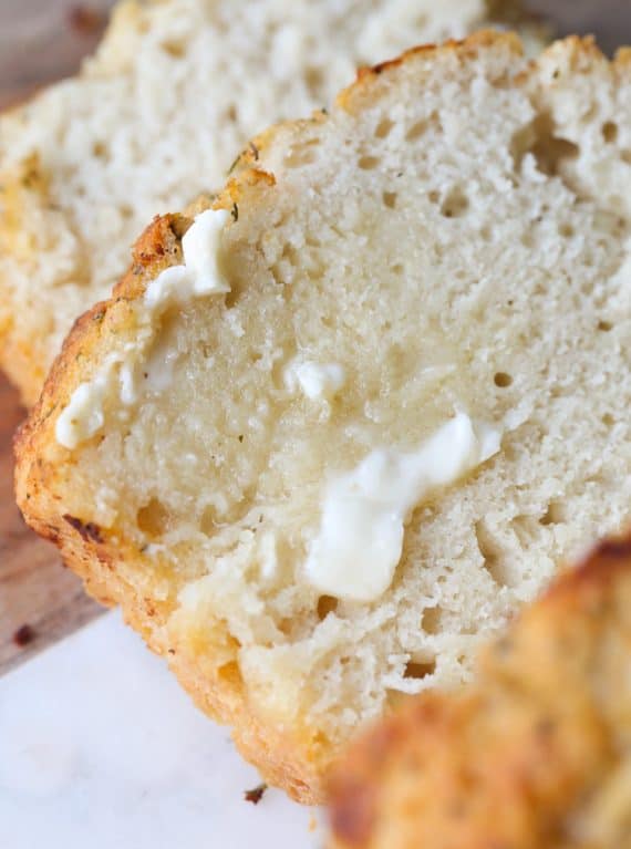Ranch Beer Bread.. so quick and easy with a crunchy buttery crust flavored with ranch seasoning!