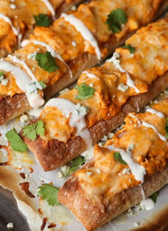 Cheesy Buffalo Chicken Stuffed Bread...slice it small for a great appetizer, or slice it large for dinner sized sandwiches!
