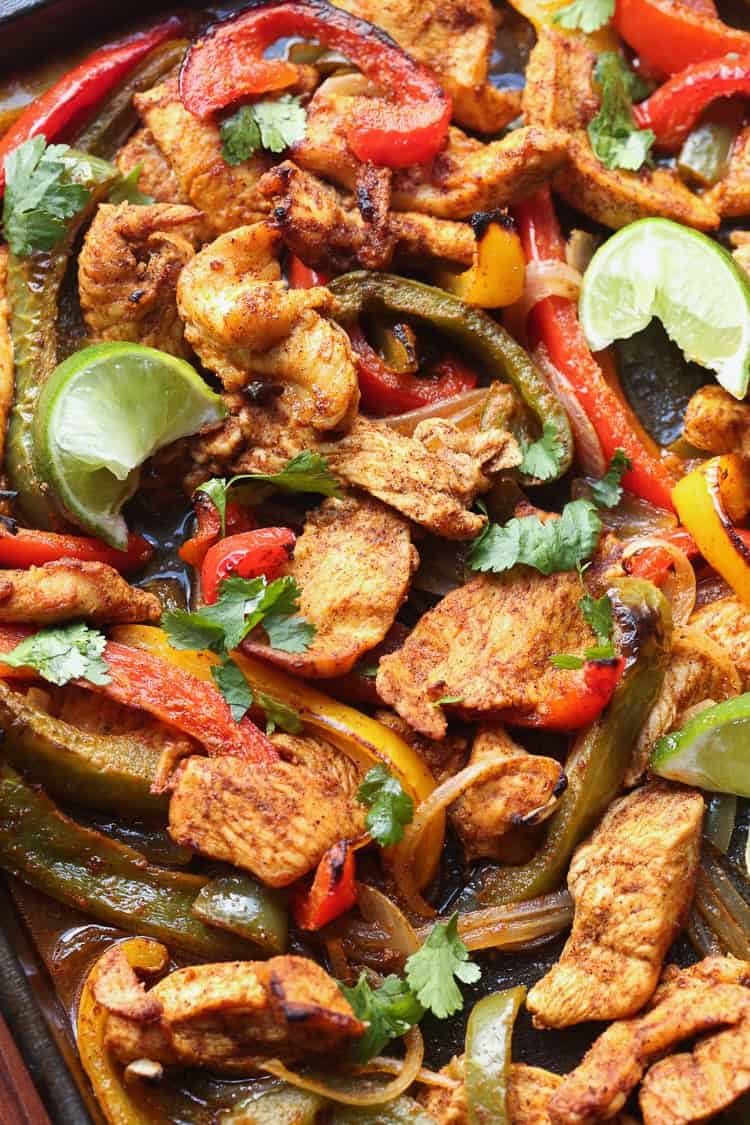 Sheet Pan Fajitas are such an easy and delicious weeknight dinner idea! They're done in under 30 minutes!