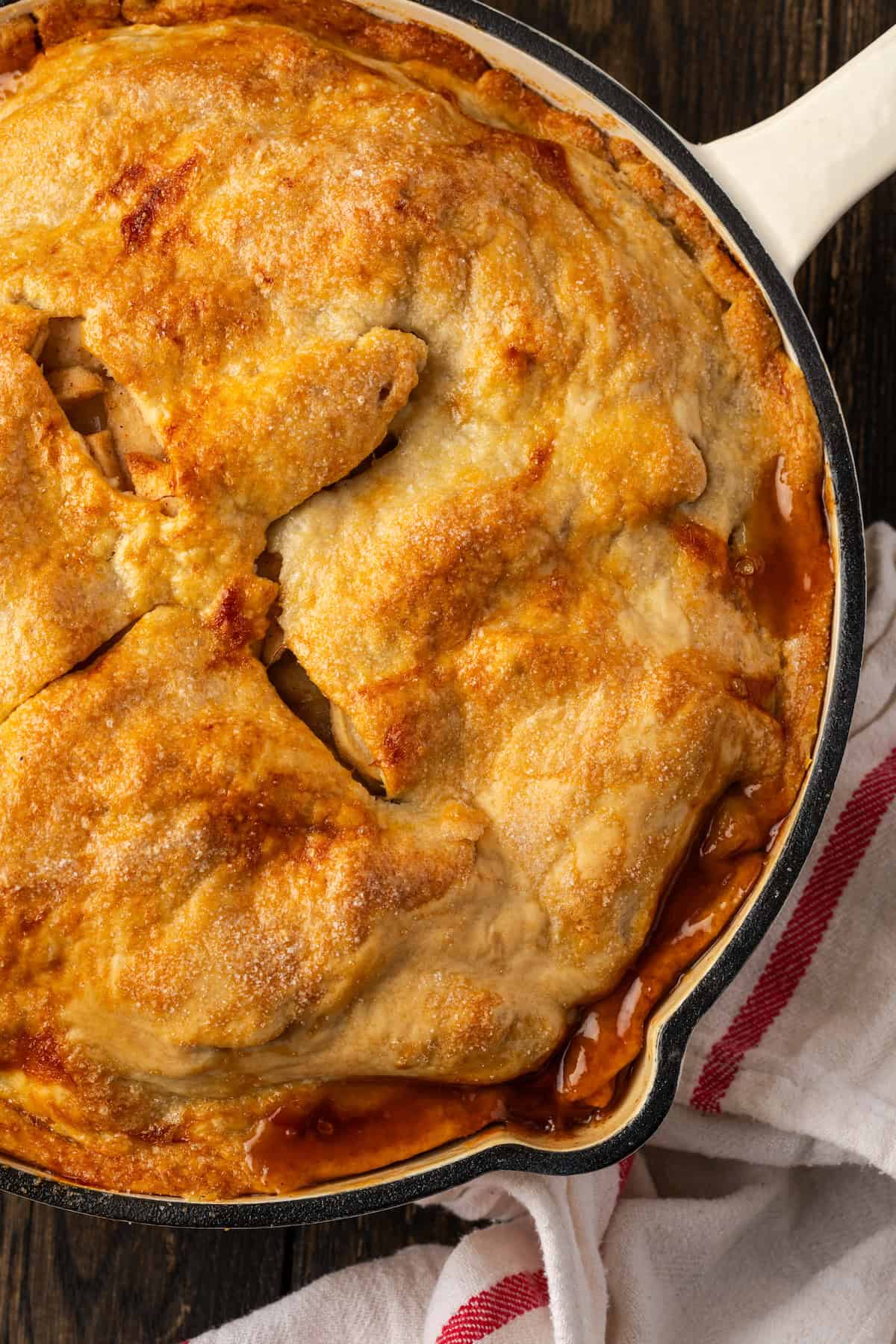 Overhead close up view of a freshly baked skillet apple pie.