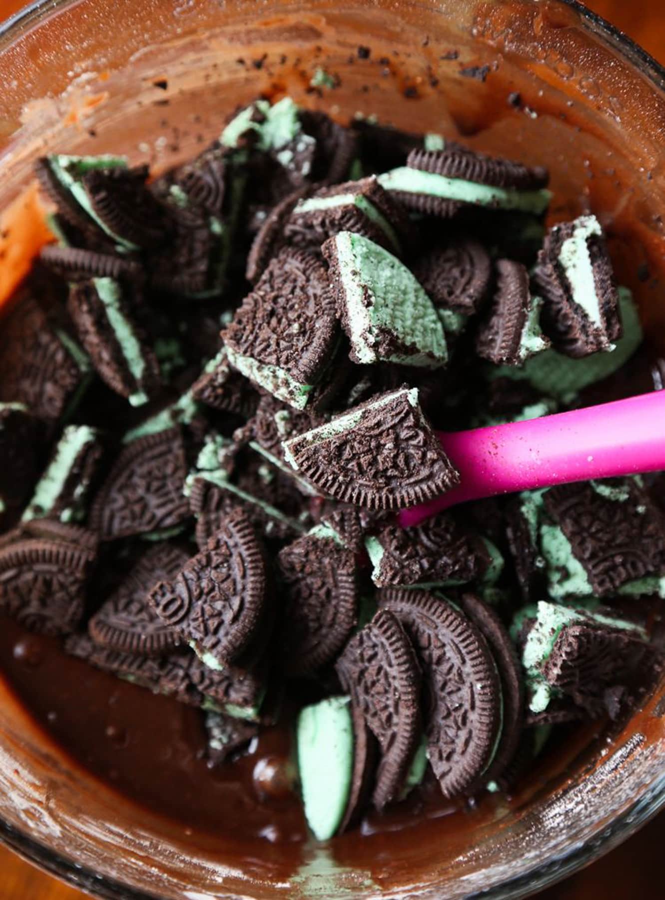 Mint oreos chopped up and mixed in a bowl