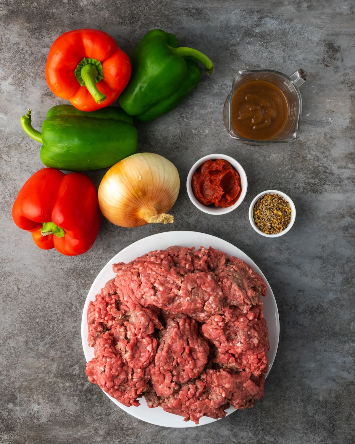 The ingredients for Crock Pot Philly Cheesesteak Sloppy Joes.