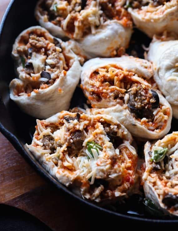 Pizza Rolls... everything you love about pizza, rolled up like a cinnamon roll! The perfect easy dinner or perfect Game Day snack!