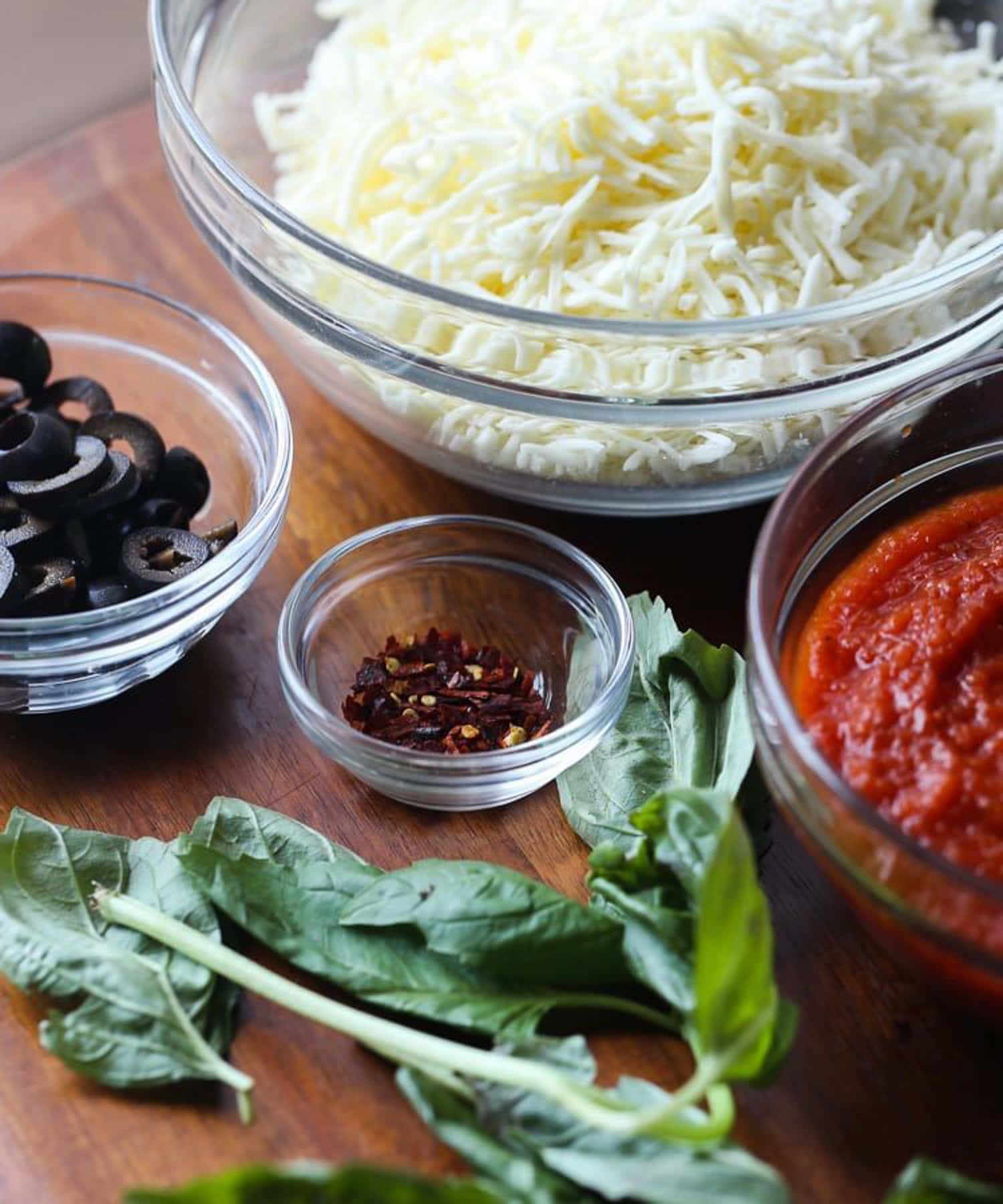 Cheese, herbs, and spices laid out for use